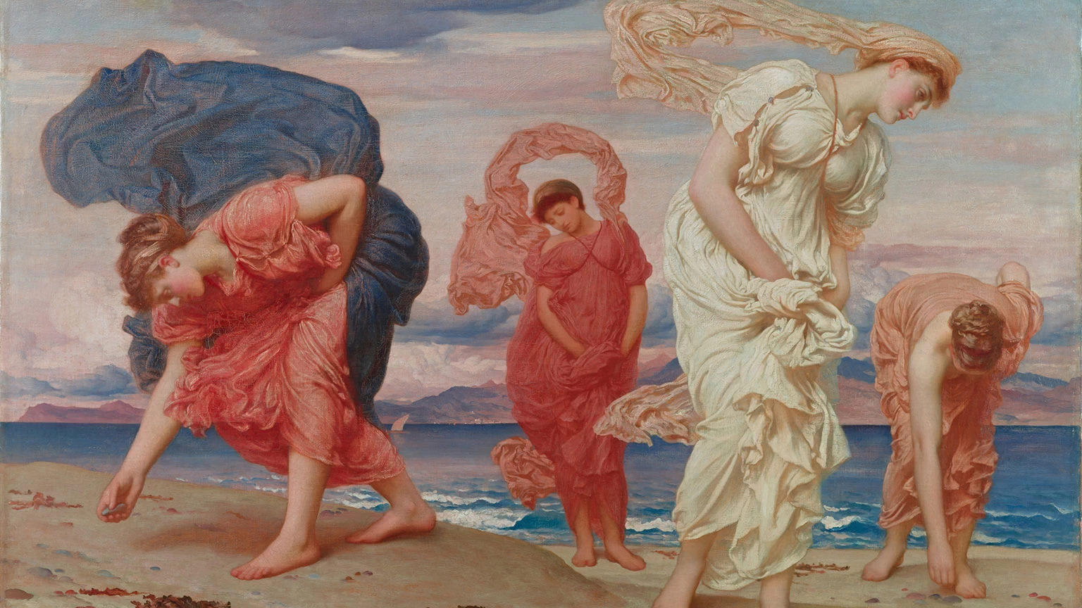 Ragazze greche che raccolgono ciottoli in riva al mare